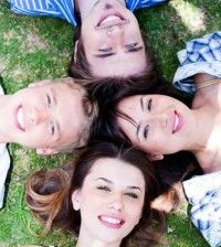 four loving and true friends with heads joined to express soulmates