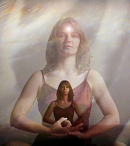a girl sitting in meditative posr and using the power of belief