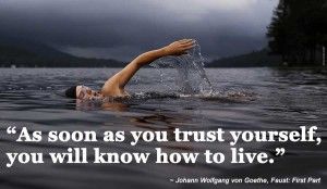 A man trusting himself and swimming in the sea