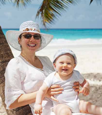 woman with baby on beach showing how mothers are special in a family