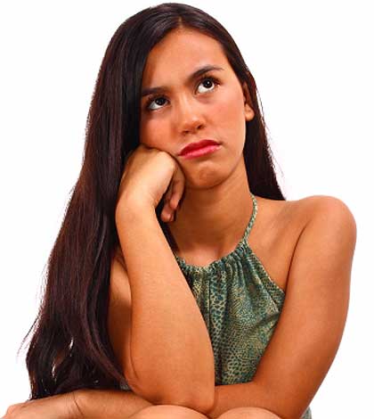 a girl showing signs of typical teenage mood swings