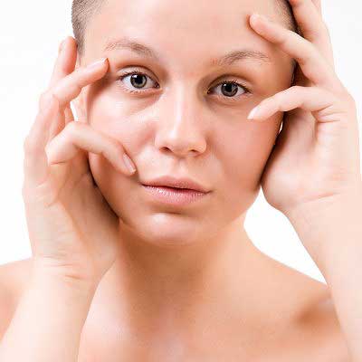 Girl with hair plucked from face which is one of the ways to reduce stress