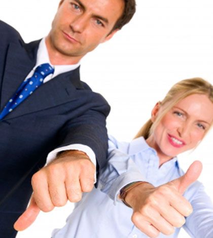 man and woman with thumbs up and down telling key to success