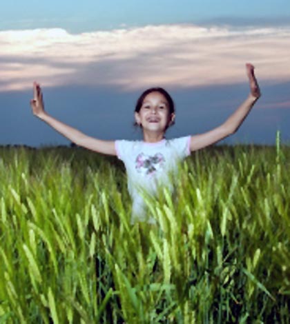 child letting go of stress and happy
