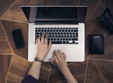 A blogger working on a laptop