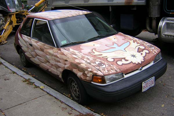 Car painted as a brown bird