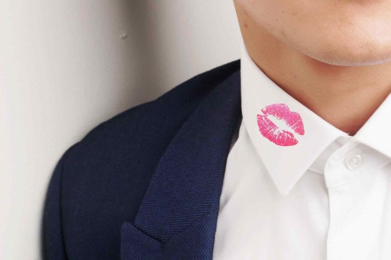A kiss mark on shirt collar of man