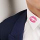 A kiss mark on shirt collar of man
