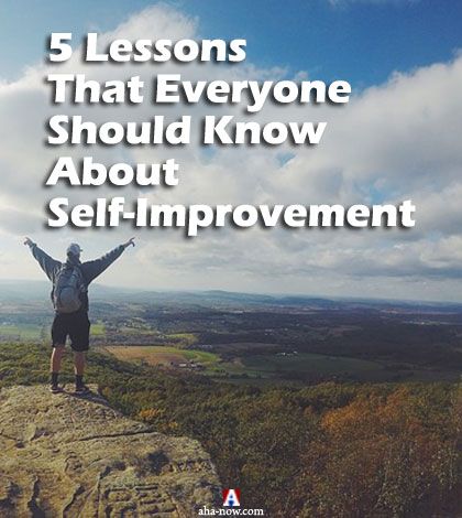 Man atop a mountain learning the lessons of self-improvement journey