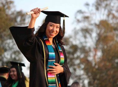 A woman college graduate completing college education