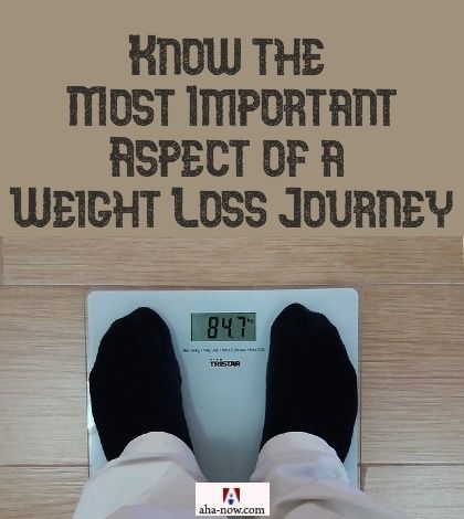 A person standing on a weighing machine to measure weight loss