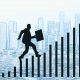 Clip-art of man with briefcase in hand climbing the corporate ranks ladder