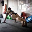 Woman doing exercise at her home gym setup
