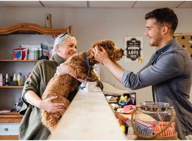 Pet dog with owner at a pet shop