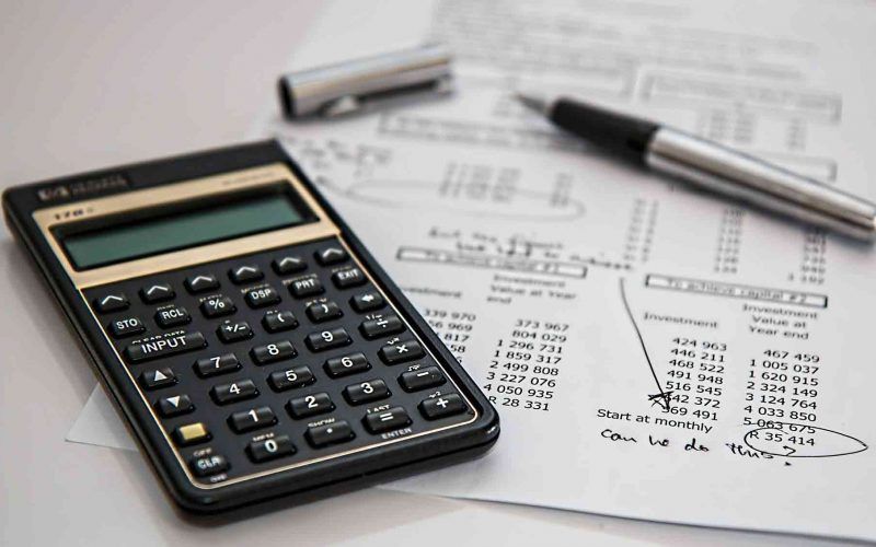 calculator with tax filing documents