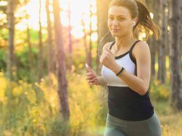 A woman jogging in the woods