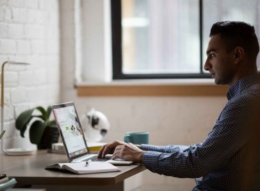 Business man working online on laptop at home