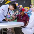 Doctor and medical staff attending to a patient