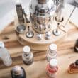 A collection of perfume making equipment, oils, and chemicals for DIY perfumery.